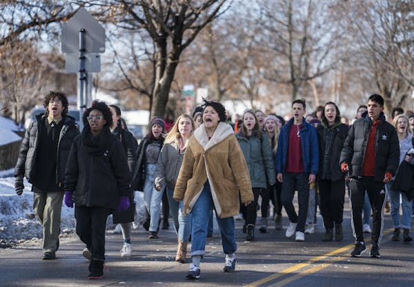 Several hundred high school student from Minneapolis including Leila Chaplin of Southwest H.S.marched to Minneapolis City Hall to rally for safer scho