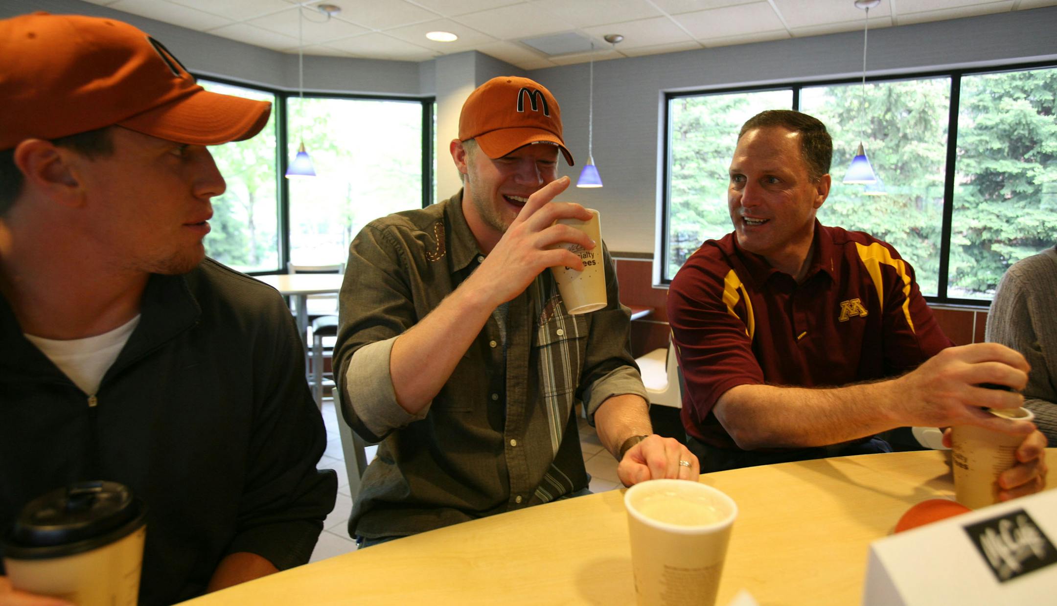 The Vikings' Chad Greenway, left, the Wild's Mark Parrish and Gophers football coach Tim Brewster were on hand at the McDonald's in Golden Valley for the unveiling of the McCafé product line of specialty coffees. It's their biggest product launch since the breakfast menu in 1977, McDonald's said.
