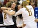 Minnesota players, including outside hitter Alexis Hart (19), right of center, and middle blocker Regan Pittman (21), celebrated after sweeping UCLA i