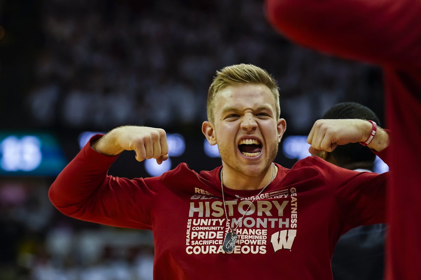 Wisconsin's Brad Davison, sidelined by a suspension, celebrated after a teammate was fouled by a Michigan State player during last Saturday's victory over Michigan State.