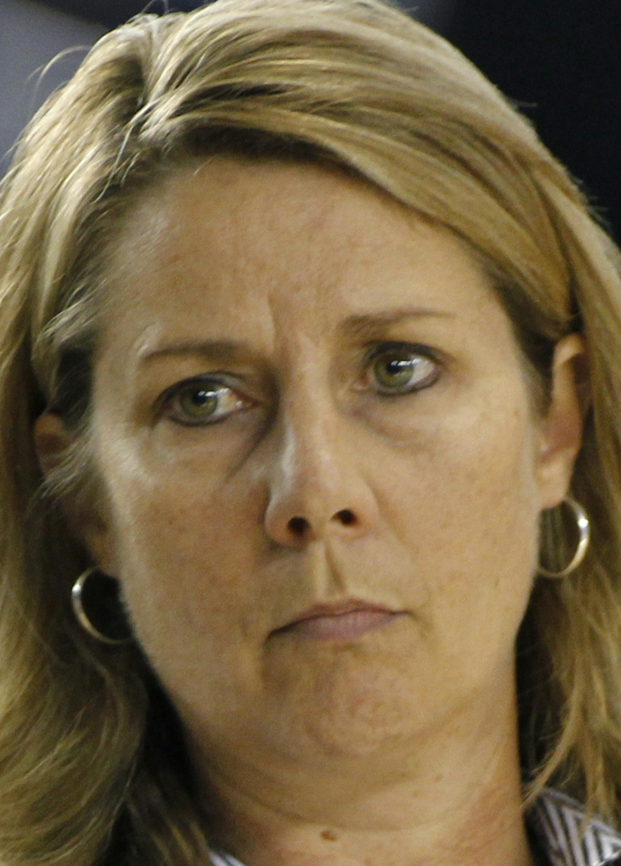 Minnesota Lynx head coach Cheryl Reeve keeps an eye on her team against the Seattle Storm's during the second half of a WNBA basketball playoff game in Tacoma, Wash. on Sunday, Sept. 22, 2013. Photo/John Froschauer) ORG XMIT: OTK