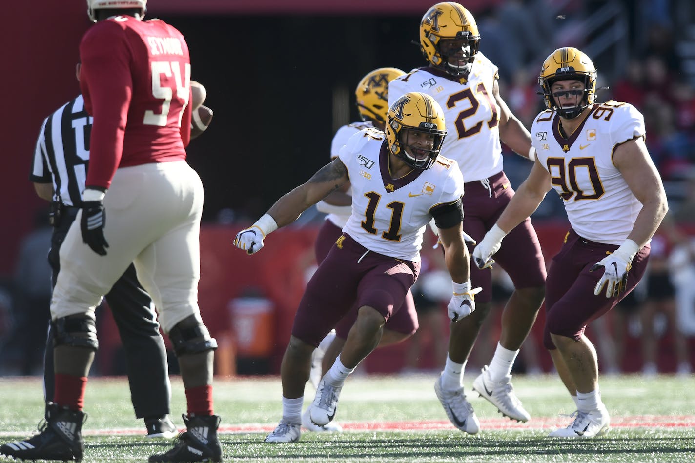 Gophers defensive back Antoine Winfield Jr. (11) celebrated after intercepting a pass thrown by Rutgers quarterback Johnny Langan (17) in the first quarter. ] Aaron Lavinsky &#x2022; aaron.lavinsky@startribune.com The Gophers played Rutgers on Saturday, Oct. 19, 2019 at SHI Stadium in Piscataway, N.J..