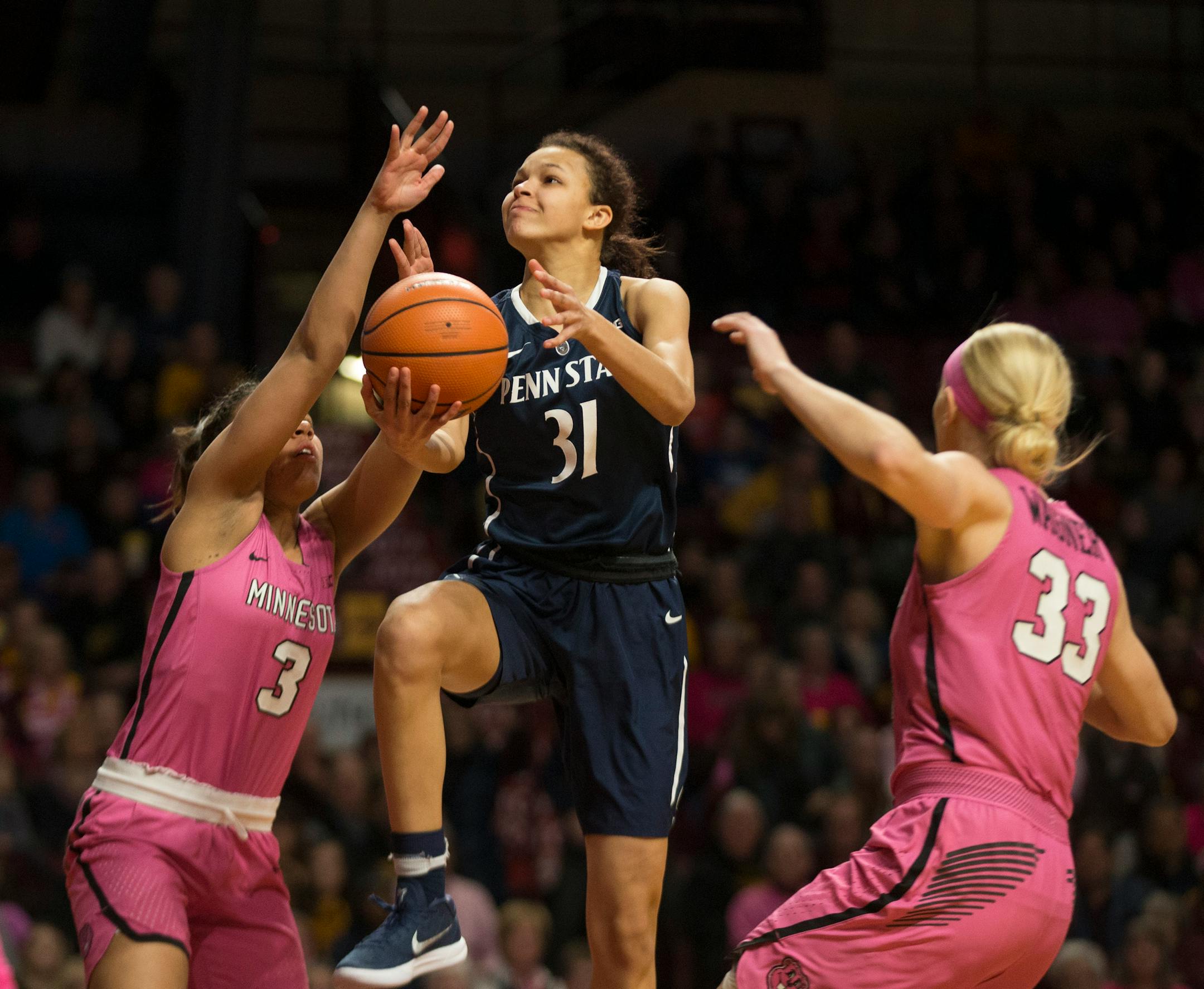 Penn State Lady Lions guard Jaida Travascio-Green (31) spits the defense of Minnesota Golden Gophers guard/forward Destiny Pitts (3) and Carlie Wagner (33) for a fist half basket on Sunday, Feb. 11, 2018 at Williams Arena in Minneapolis, Minn. Minnesota beat Penn State, 101-68.