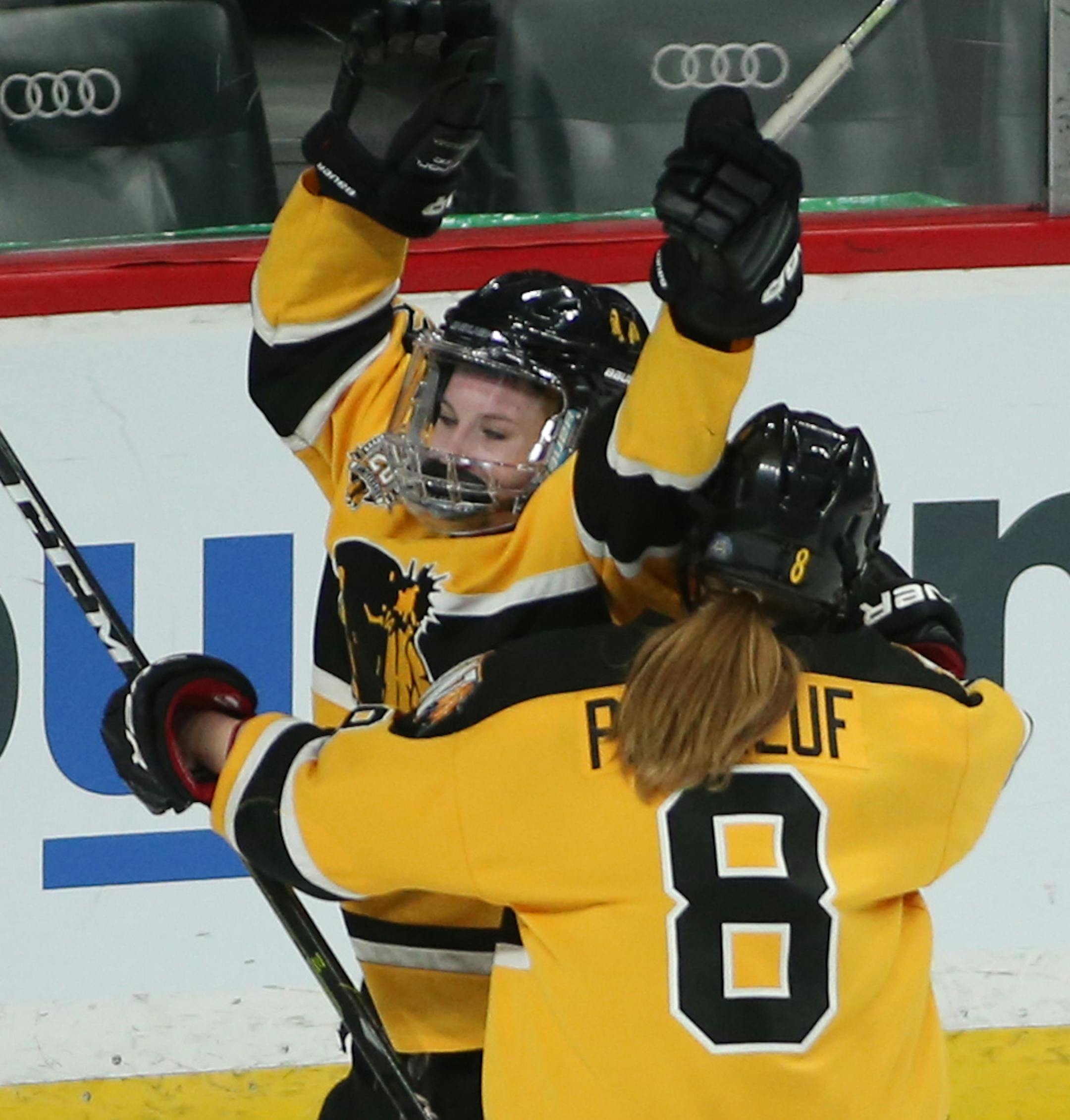 Warroad's Sydney Phaneuf (8) hugged Hannah Corneliusen (23) after Corneliusen scored in the third period. ] Shari L. Gross ¥ shari.gross@startribune.com Warroad defeated Proctor Hermantown 5-2 in a Class 2A semifinal hockey game at the MSHSL hockey tournament on Friday, Feb. 22, 2019 at the Xcel Energy Center in St. Paul, Minn.
