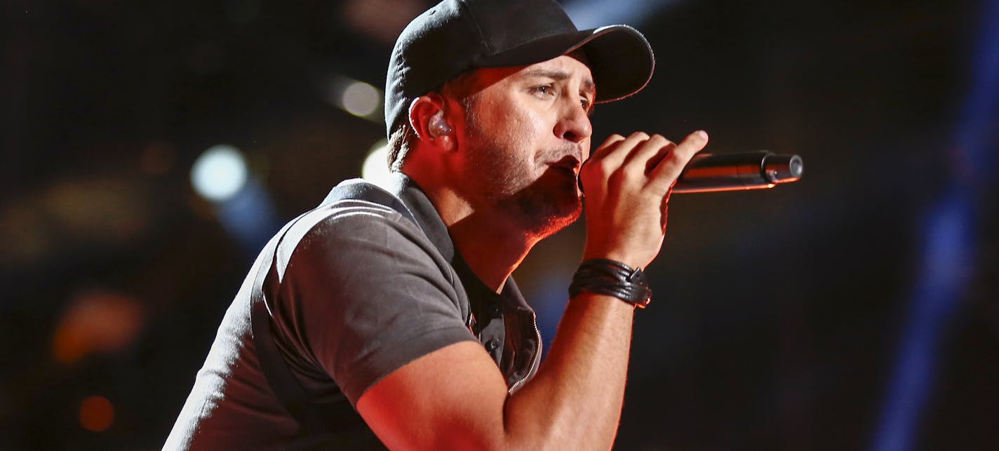 Like Bryan performs at LP Field at the CMA Music Festival on Friday, June 12, 2015, in Nashville, Tenn. (Photo by Al Wagner/Invision/AP)