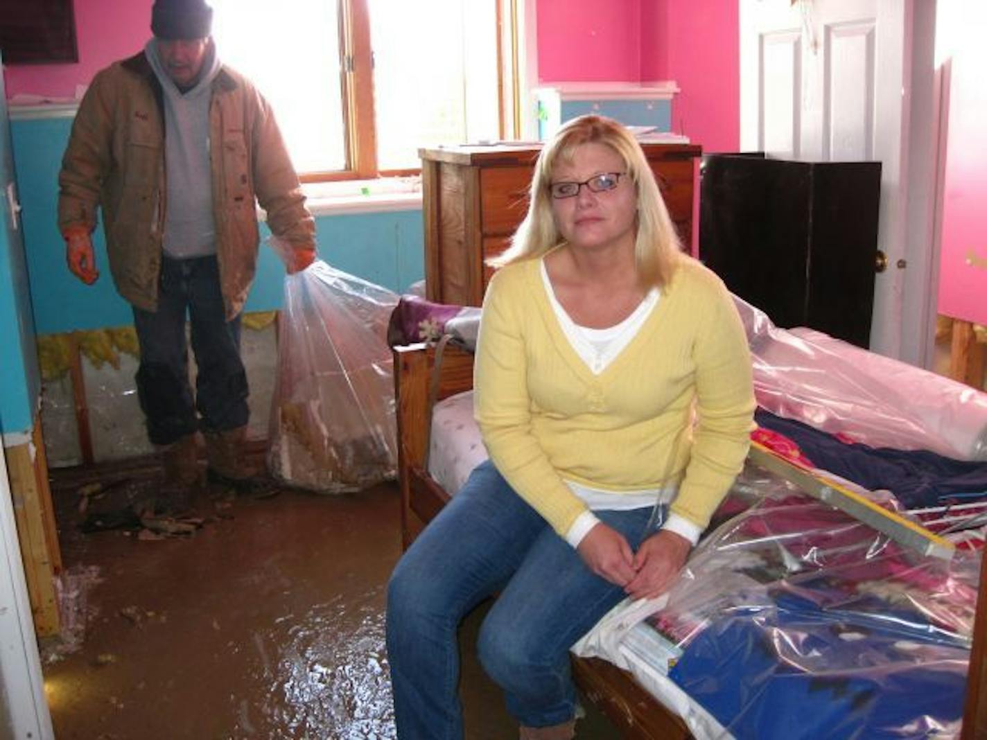 From one side of Chanhassen Hills Drive to the other, residents learned that something was terribly wrong in their homes Wednesday night when a geyser of sewage began spewing from toilets on the lower level. For Amy Powell and her husband, Carlos Puig, the ensuing mess, caused by a broken water main, ruined the last of a seven-year remodeling effort. As much as 3 inches of sewage had covered the floor of their split-level home. On Thursday rolls of ruined carpet were heaped in the snow next to t