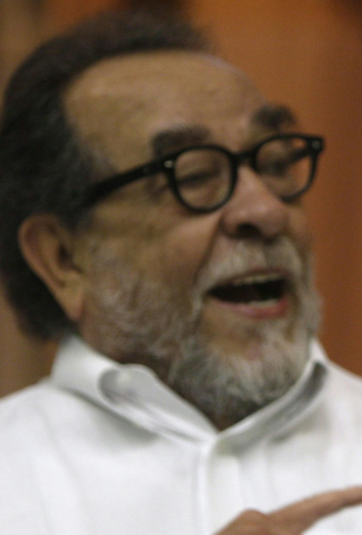 Brazil's former President Luiz Inacio Lula da Silva, right, holds the book "The Last Soldiers of the Cold War" about the five Cuban intelligence agents who are imprisoned in U.S. by Brazilian writer Fernando Morais, left, during its presentation in Havana, Cuba, Tuesday, Jan. 29, 2013. (AP Photo/Ismael Francisco, Cubadebate) ORG XMIT: NYOTK