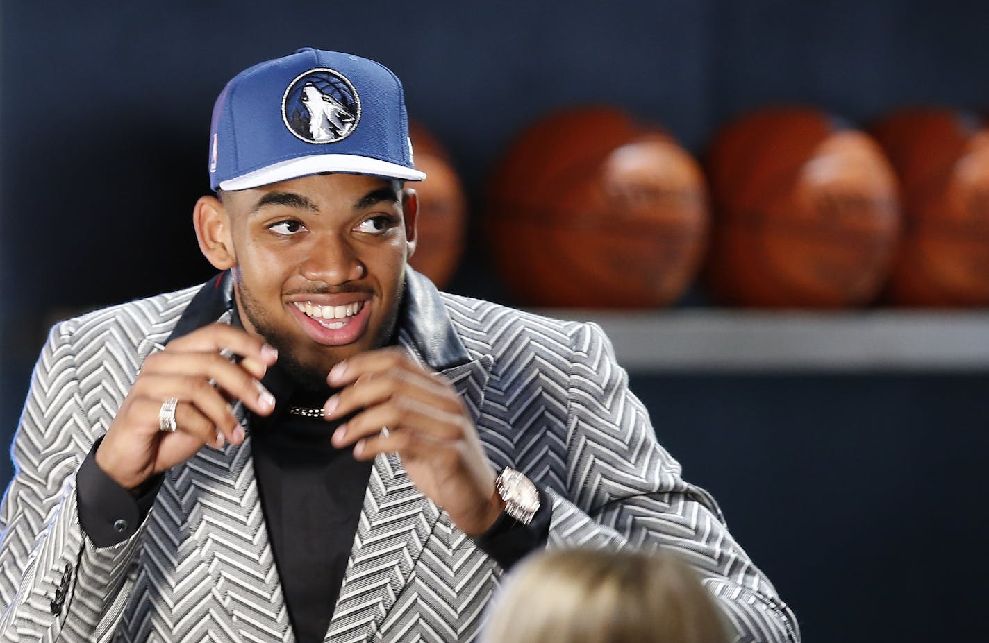 Karl-Anthony Towns reacts after being selected first overall by the Minnesota Timberwolves during the NBA basketball draft, Thursday, June 25, 2015, in New York. (AP Photo/Kathy Willens)