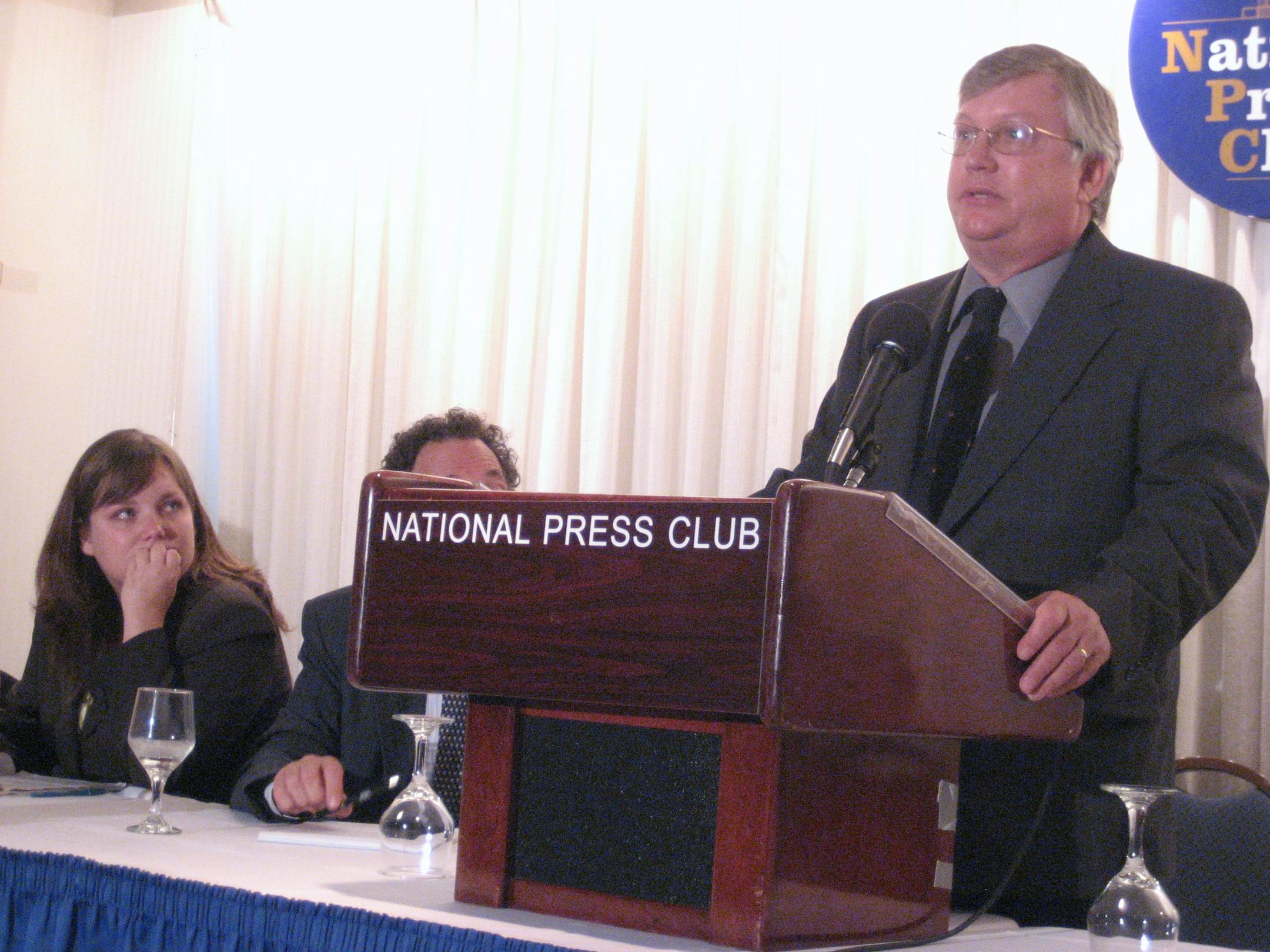 Scott Erlinder, brother of St. Paul attorney Peter Erlinder, speaks at a press conference in Washington, D.C., on Thursday, June 3, 2010, as Erlinder's daughter Sarah Erlinder looks on.