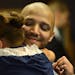 From left, Saniah King, 6, hugged her father, Veteran graduate Charles King after the Veterans graduation ceremony held in the Ramsey County District 