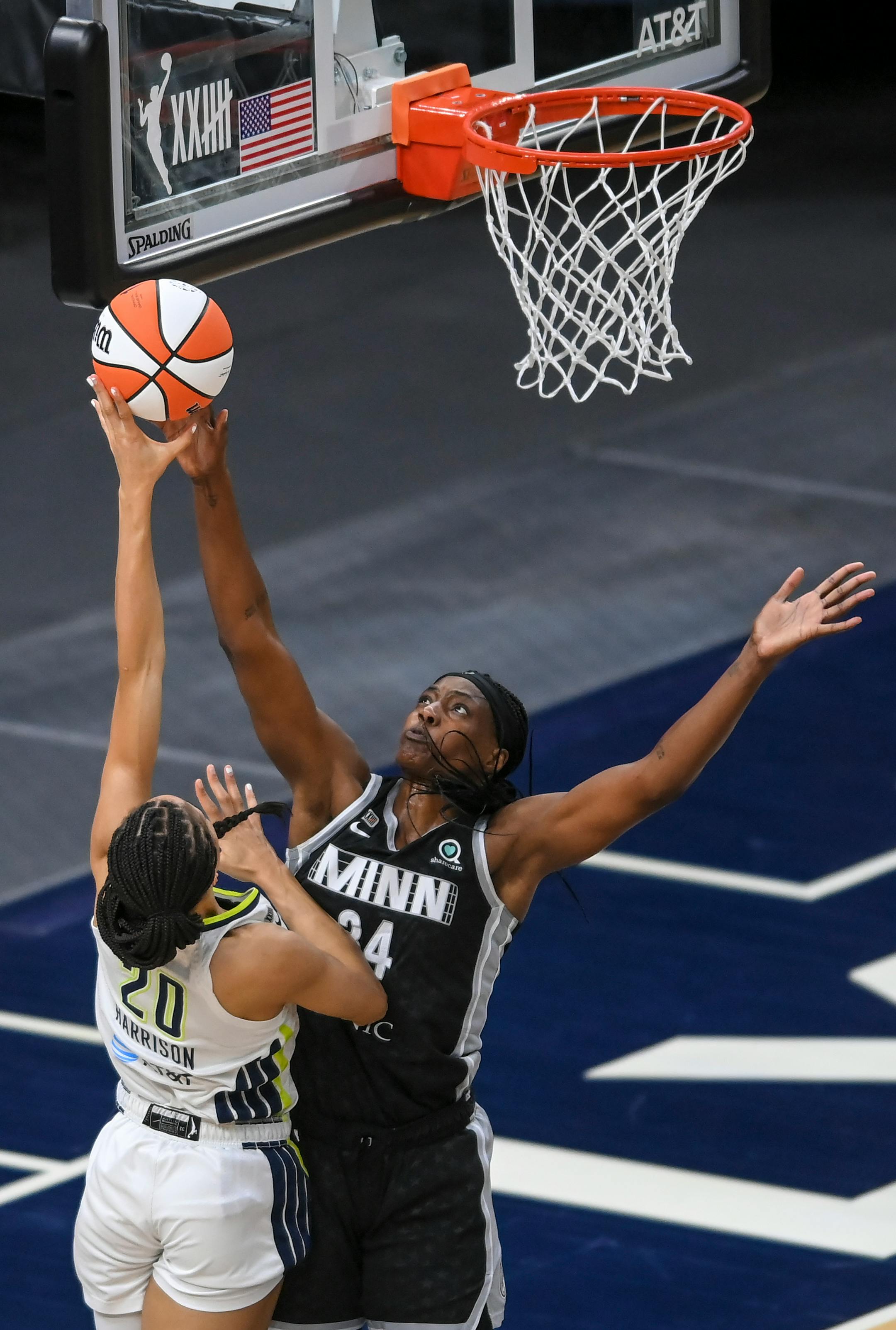 Minnesota Lynx center Sylvia Fowles (34) blocked a shot by Dallas Wings forward Isabelle Harrison (20) in the first half.