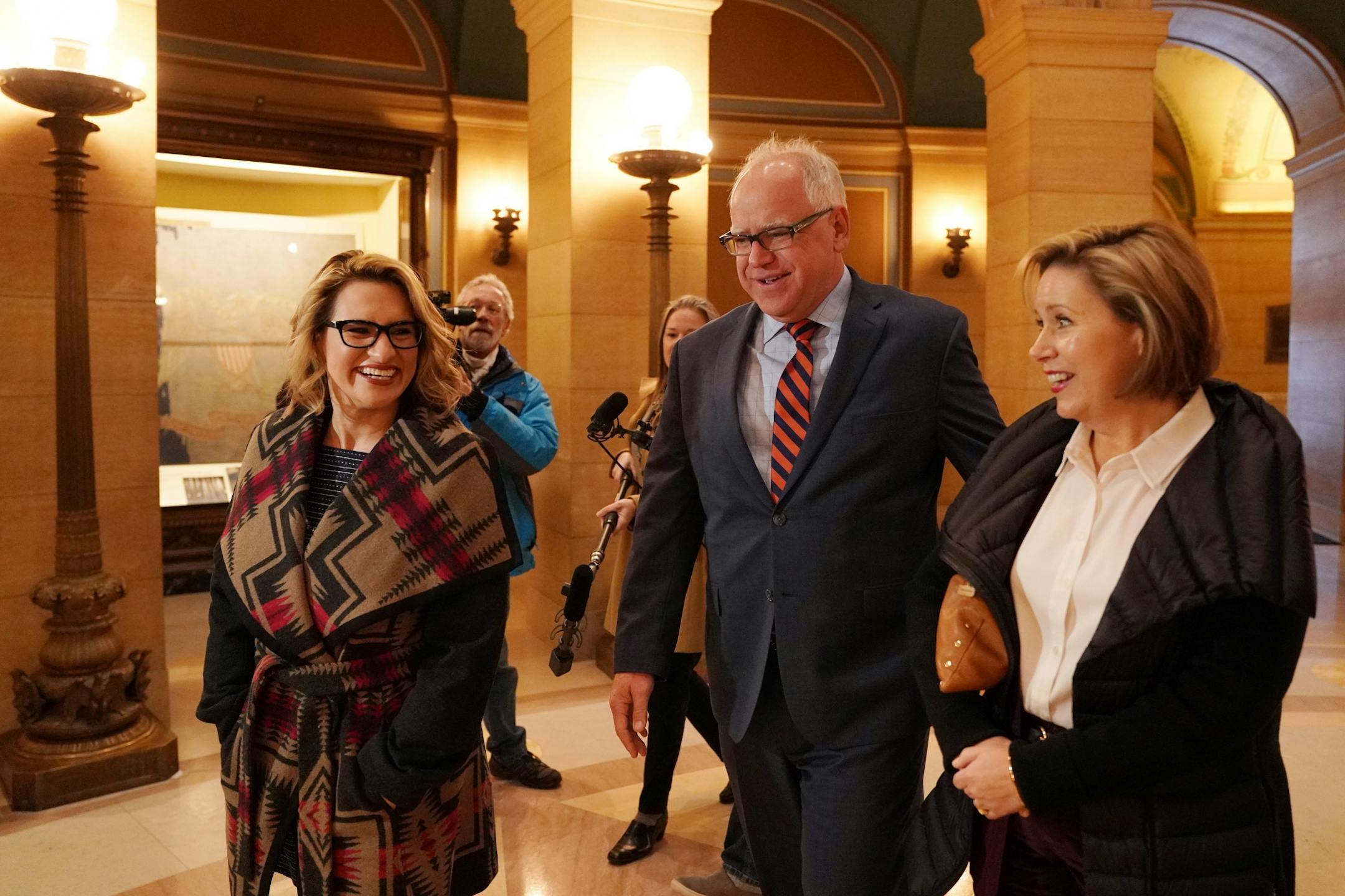 Lt. Gov.-elect Peggy Flanagan, Gov.-elect Tim Walz, and his wife Gwen took in the rotunda as they arrived at the State Capitol Thursday morning.