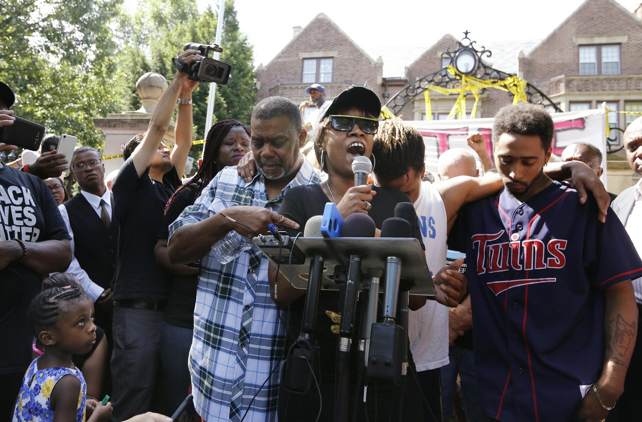 Diamond Reynolds, the girlfriend of Philando Castile, who died after being shot by police during a traffic stop in Falcon Heights on Wednesday, July 6, 2016, speaks during a press conference at the governor's residence. At her left is Philando Castile's uncle, Clarence Castile.