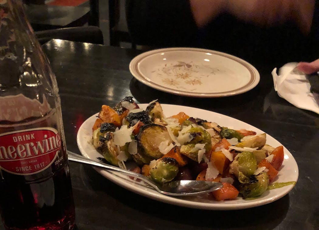 Roasted Brussels sprouts steal the show at Pizzeria Lola.