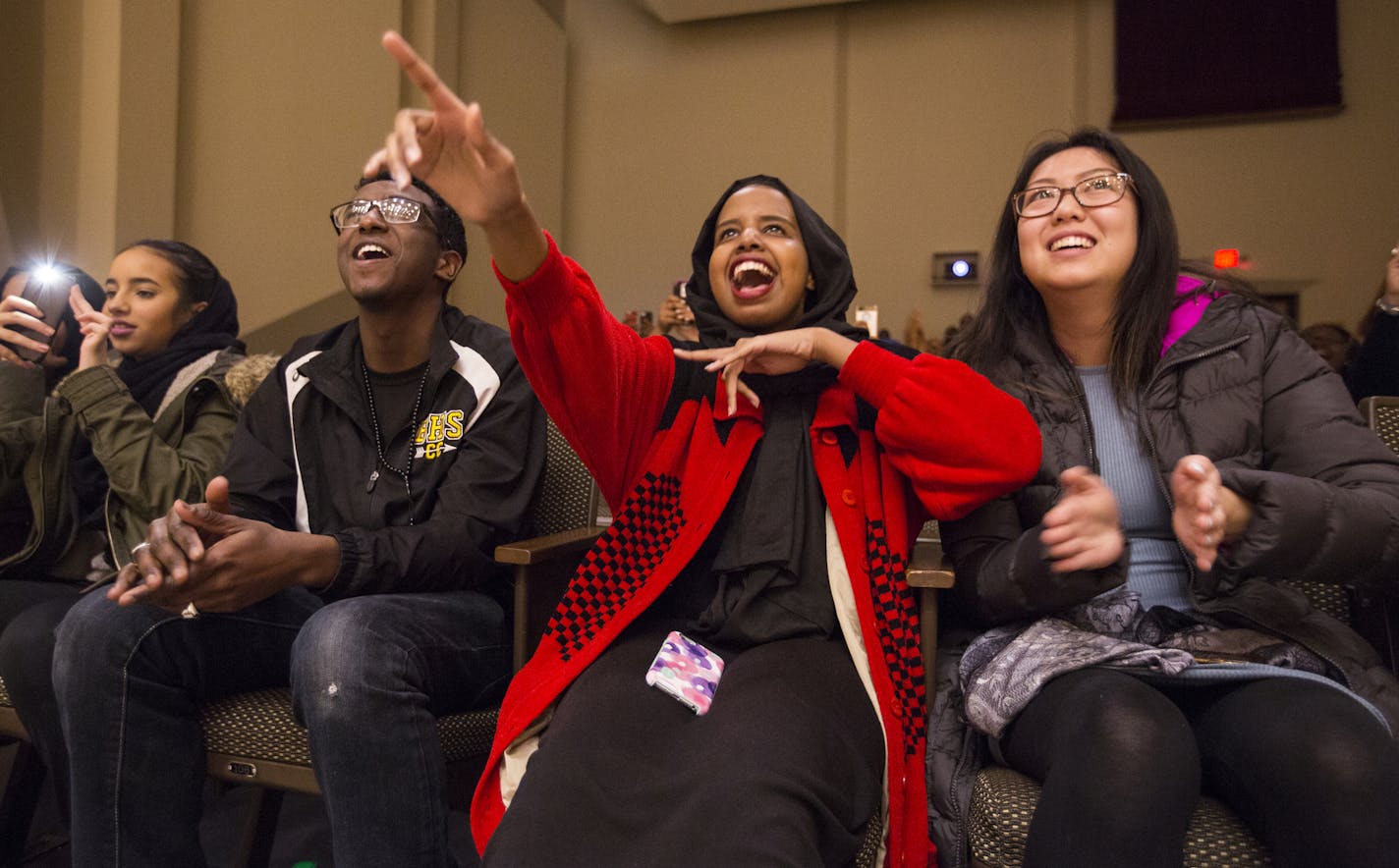 Audience members react during a Hijab Fashion Show at Augsburg College in Minneapolis on Wednesday, February 3, 2016. From left is Ali Ali, 19, Halimo Omar, 18, and Destiny Xiong, 18. ] (Leila Navidi/Star Tribune) leila.navidi@startribune.com BACKGROUND INFORMATION: Is the 'hijab solidarity' movement an appropriate way to show support for Muslims at a time when so many feel under siege, or is it cultural appropriation? From the professor at a Christian College who drew praise and ire for her act