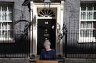 Britain's Prime Minister Theresa May speaks to the media outside her official residence of 10 Downing Street in London, Tuesday April 18, 2017. Britis