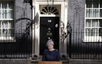 Britain's Prime Minister Theresa May speaks to the media outside her official residence of 10 Downing Street in London, Tuesday April 18, 2017. Britis