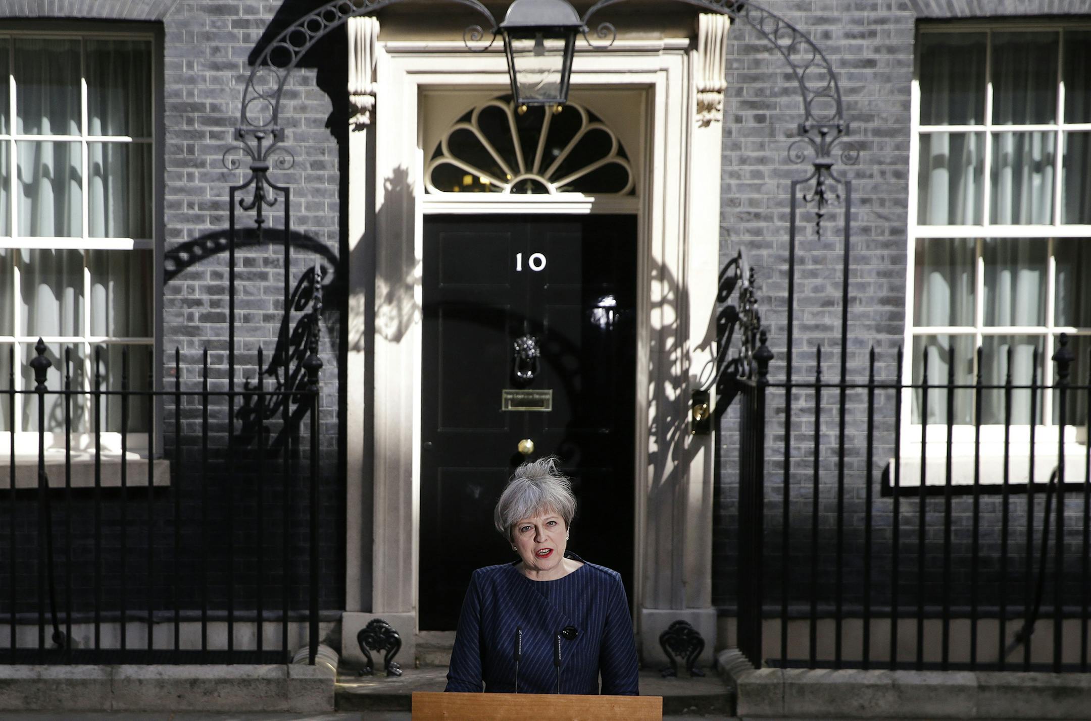 Britain's Prime Minister Theresa May speaks to the media outside her official residence of 10 Downing Street in London, Tuesday April 18, 2017. British Prime Minister Theresa May announced she will seek early election on June 8 (AP Photo/Alastair Grant) ORG XMIT: MIN2017041912052430