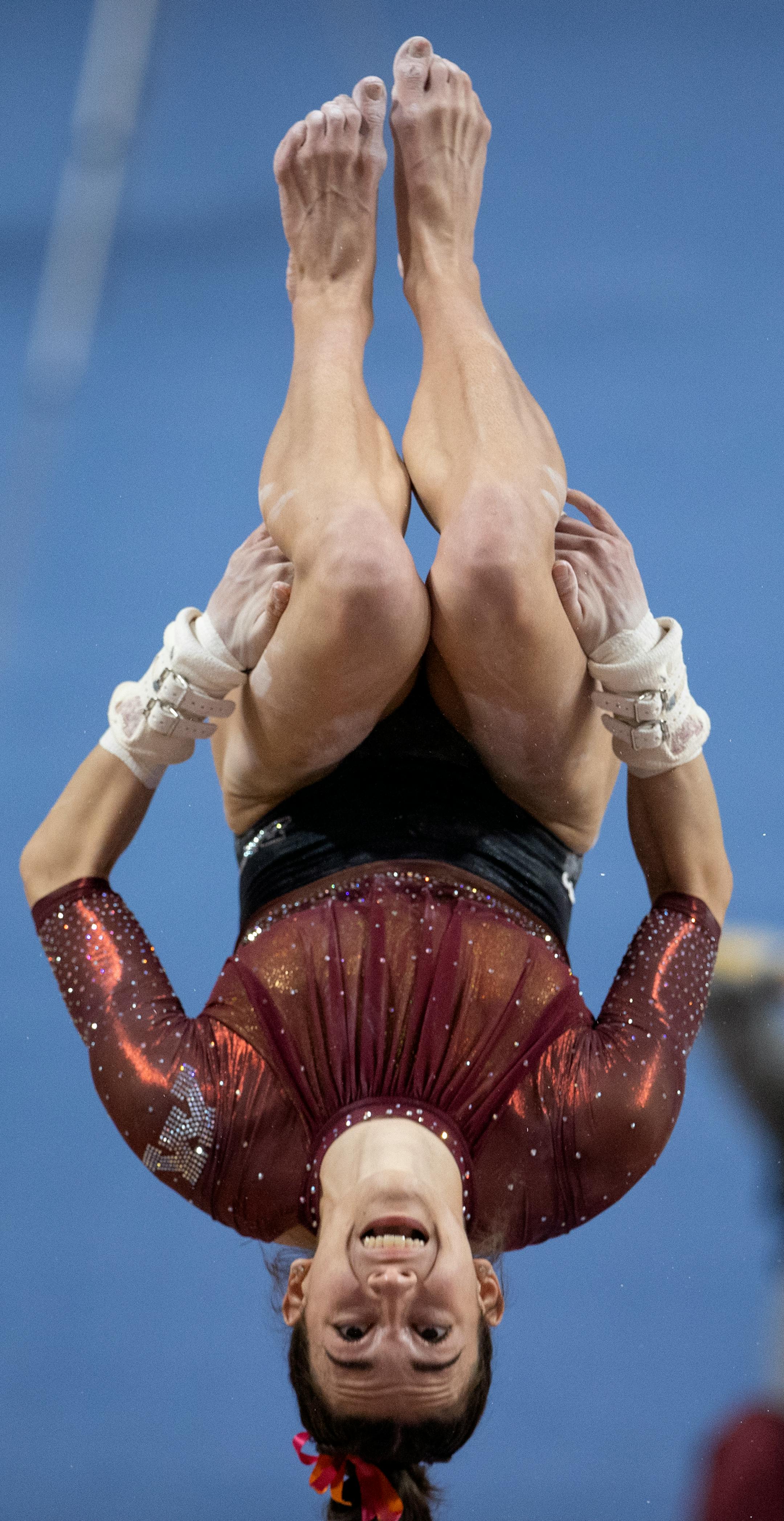 Ona Loper of Minnesota competes in the uneven bars.