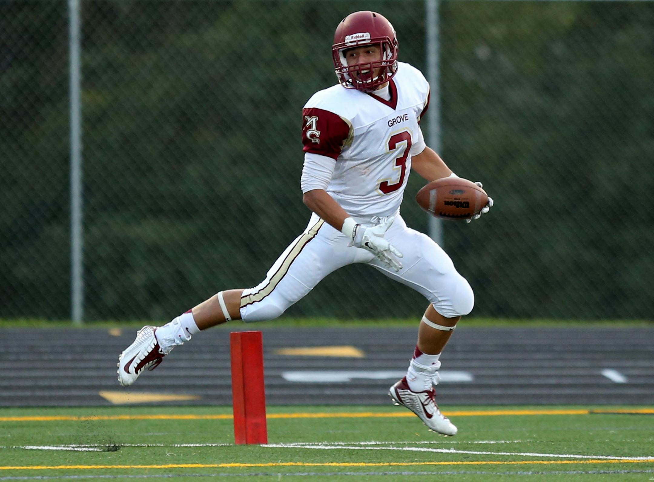 Maple Grove Isaac Collins ran the kickoff for a touchdown during the first half. ] (KYNDELL HARKNESS/STAR TRIBUNE) kyndell.harkness@startribune.com Wayzata vs Maple Grove in Plymouth Min., Friday, September 12, 2014.