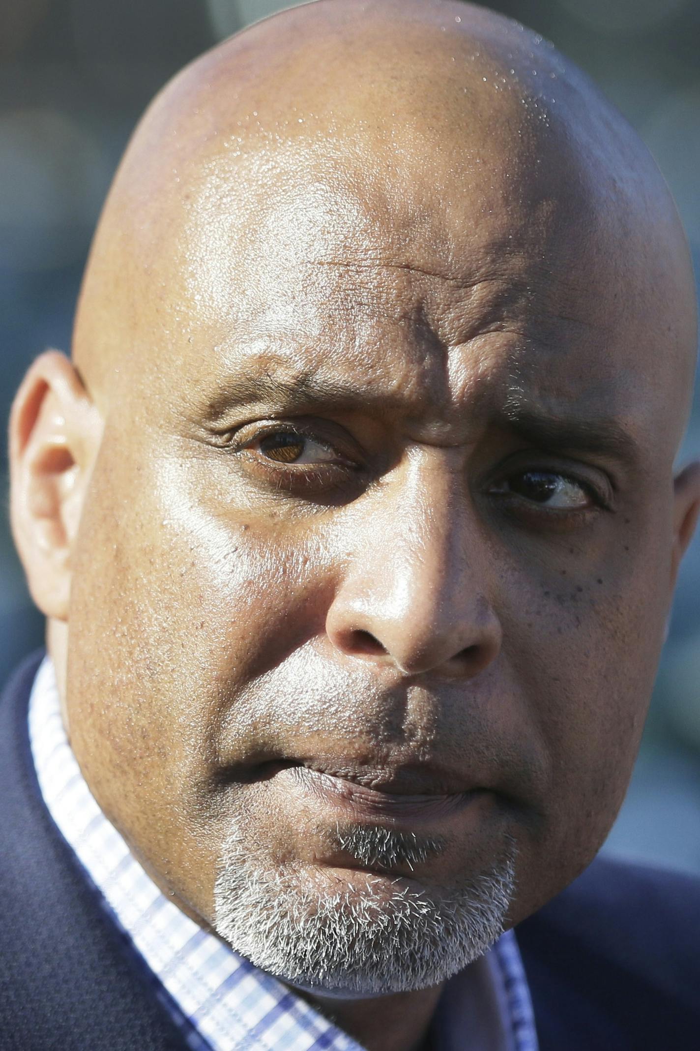 Major League Baseball Players Association executive and former Detroit Tigers first baseman Tony Clark talks to the media before a spring training exhibition baseball game between the Detroit Tigers and the Washington Nationals in Lakeland, Fla., Tuesday, March 17, 2015. (AP Photo/Carlos Osorio) ORG XMIT: otkco101