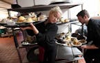 On a Friday night at Chanhassen, an army of waiters, bussers, cooks and sous chefs await the onslaught of serving more than 700 diners in the course o