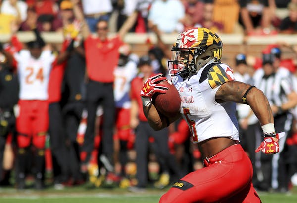 Maryland running back Ty Johnson (6) runs for a touchdown against Minnesota in the fourth quarter of an NCAA college football game on Saturday, Sept. 