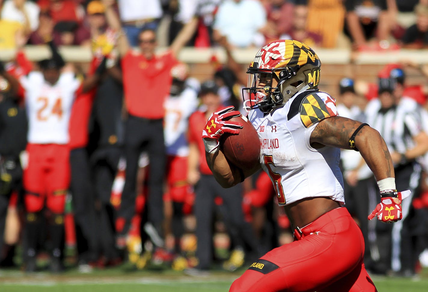 Maryland running back Ty Johnson (6) runs for a touchdown against Minnesota in the fourth quarter of an NCAA college football game on Saturday, Sept. 30, 2017, in Minneapolis. Maryland defeated Minnesota 31-24. (AP Photo/Andy Clayton-King) ORG XMIT: MNAK107