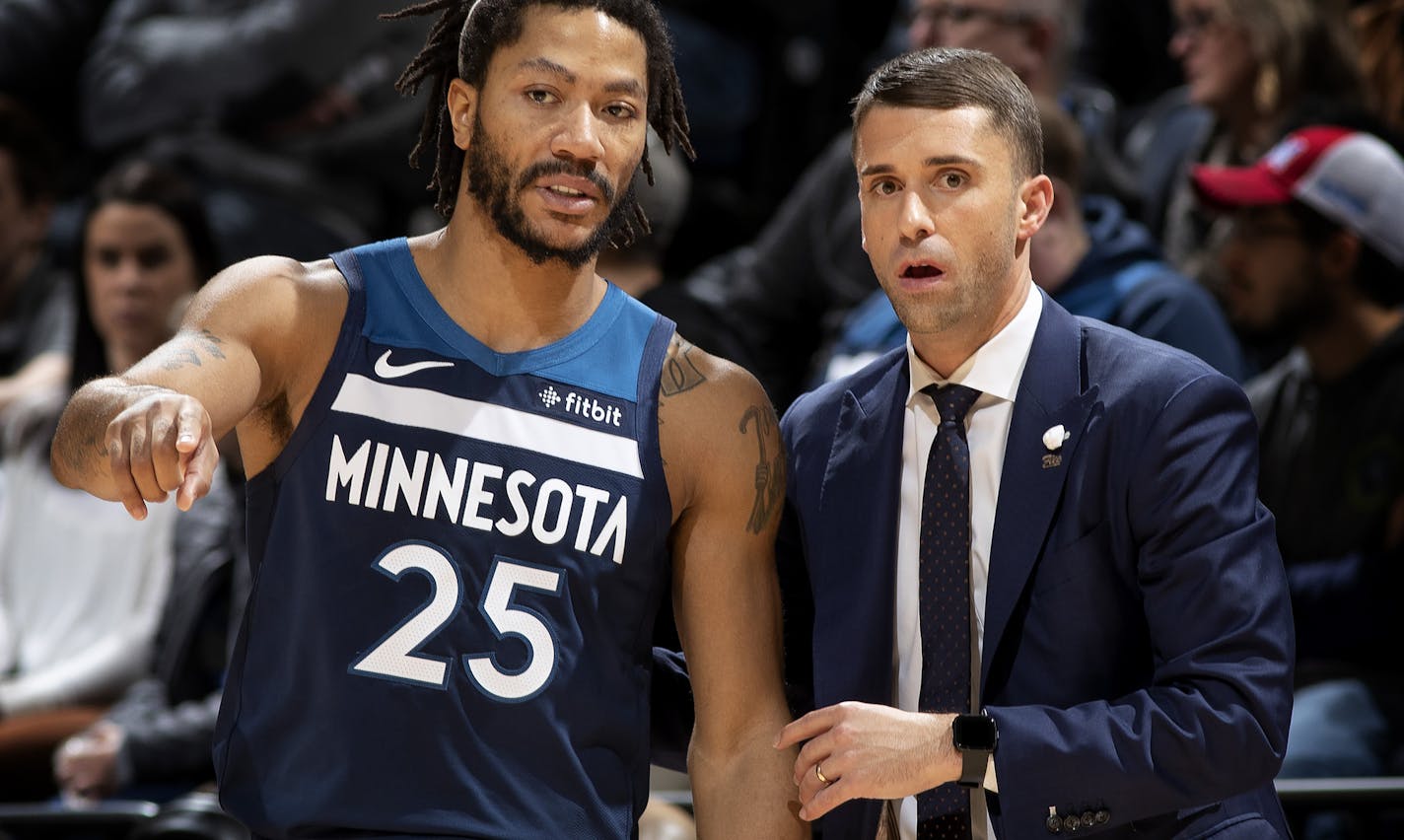 Derrick Rose with Timberwolves interim head coach Ryan Saunders.