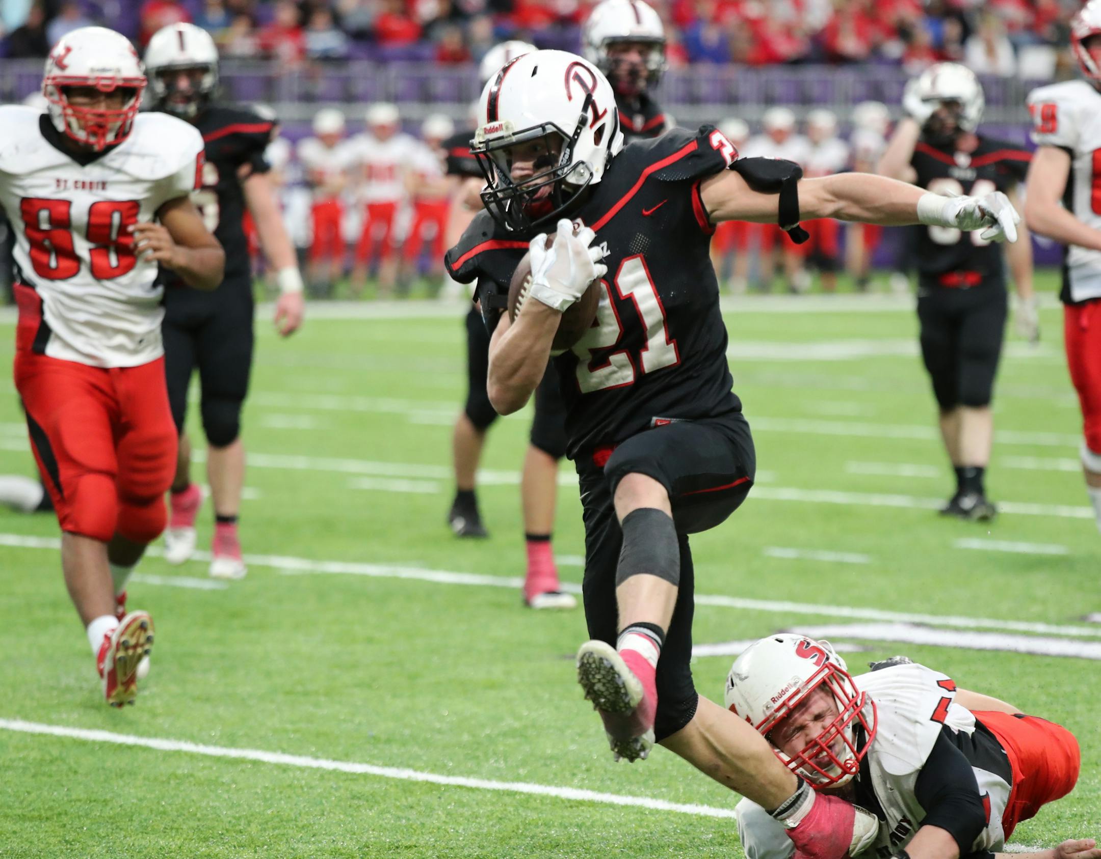 Pierz running back Reese Kapsner dodged this tackle and ran in for one of his three touchdowns in the game. ] Shari L. Gross • shari.gross@startribune.com Pierz defeated St. Croix Lutheran 34-21 in the Class 3A championship football game at U.S. Bank Stadium on Saturday, Nov. 25, 2017