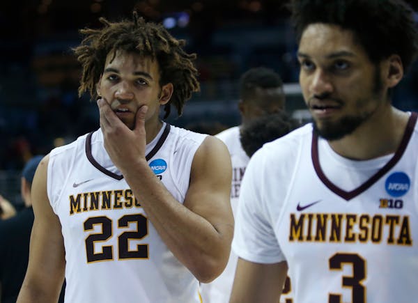Minnesota's Reggie Lynch (22) walks off the court after an NCAA college basketball tournament first round game against Middle Tennessee State Thursday