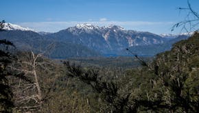 The view from a zip-line platform in Chile&#x2019;s Huilo Huilo Biological Reserve, looking east across Lake Pirehueico and the southern Andes Mountai