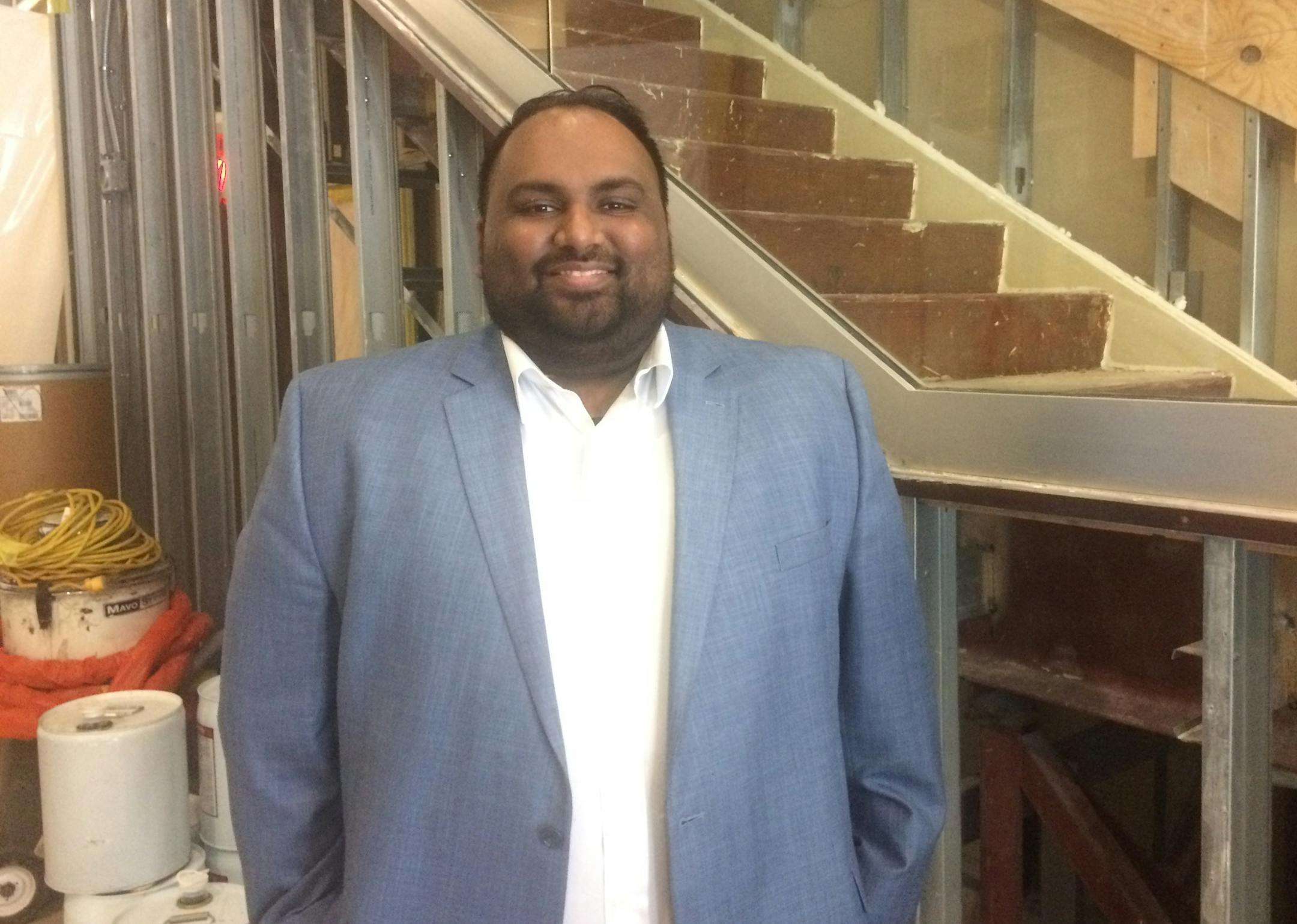 Developer-owner Harshal Patel on Friday at the Federal Plaza downtown. Construction crews have begun renovating the long-abandoned building into a 55-room boutique hotel. Neal.St.Anthony@startribune.com