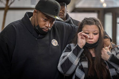 The parents of Daunte Wright, Aubrey Wright, left, and Katie Bryant cry as they wait to speak to the press after the verdict was read at the Hennepin County Government Center in Minneapolis, Minn., on Friday, February. 18, 2022. Former Brooklyn Center police officer Kimberly Potter was sentenced to two years in the fatal shooting death of Daunte Wright. ] Elizabeth Flores • liz.flores@startribune.com