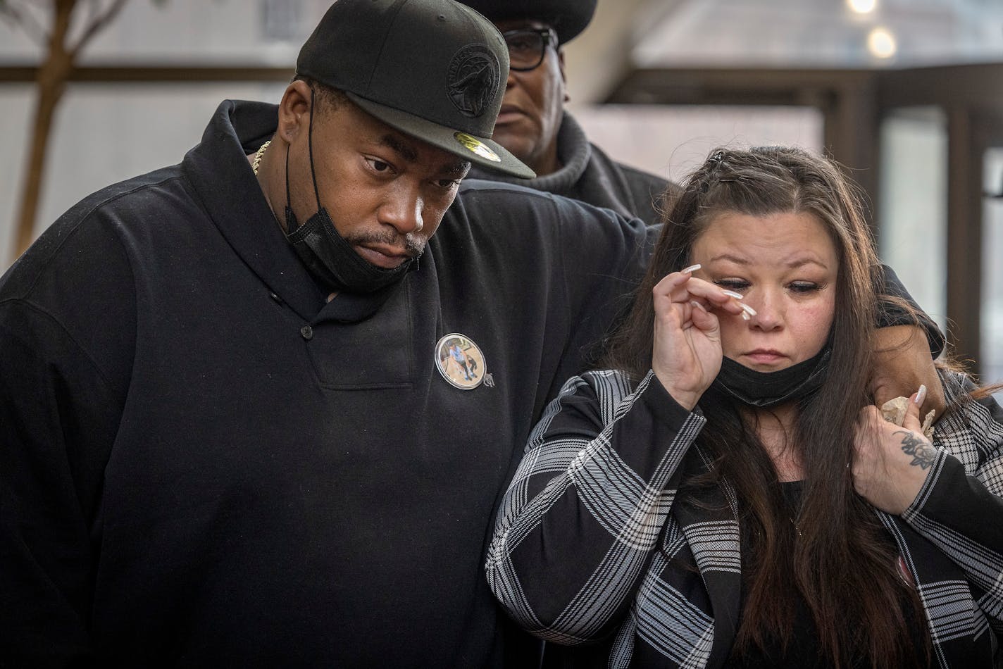 The parents of Daunte Wright, Aubrey Wright, left, and Katie Bryant cry as they wait to speak to the press after the verdict was read at the Hennepin County Government Center in Minneapolis, Minn., on Friday, February. 18, 2022. Former Brooklyn Center police officer Kimberly Potter was sentenced to two years in the fatal shooting death of Daunte Wright. ] Elizabeth Flores • liz.flores@startribune.com