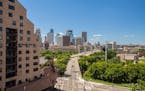 The condo overlooks the downtown Minneapolis skyline and the riverfront.