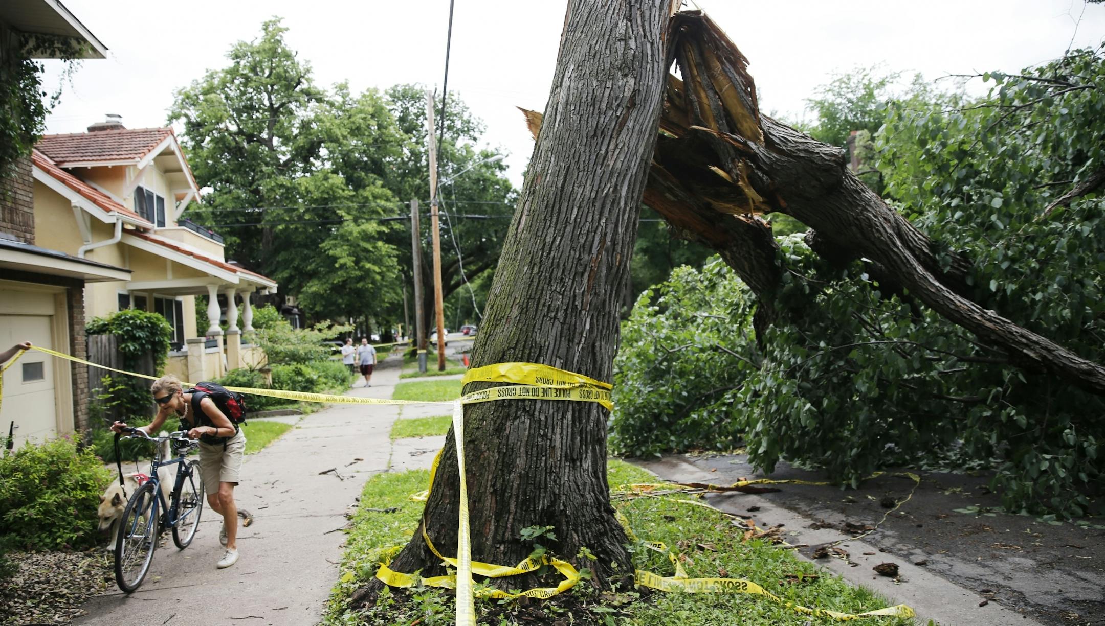 In the Minneapolis neighborhood of Uptown, Barbara Kreft ducked under caution tape after unfruitfully trying to find a cafe with internet access.