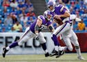 Vikings quarterback Sam Bradford was sacked by the Bills' Eddie Yarbrough (75) in the first quarter Thursday. ] CARLOS GONZALEZ � cgonzalez@startrib