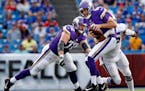 Vikings quarterback Sam Bradford was sacked by the Bills' Eddie Yarbrough (75) in the first quarter Thursday. ] CARLOS GONZALEZ � cgonzalez@startrib
