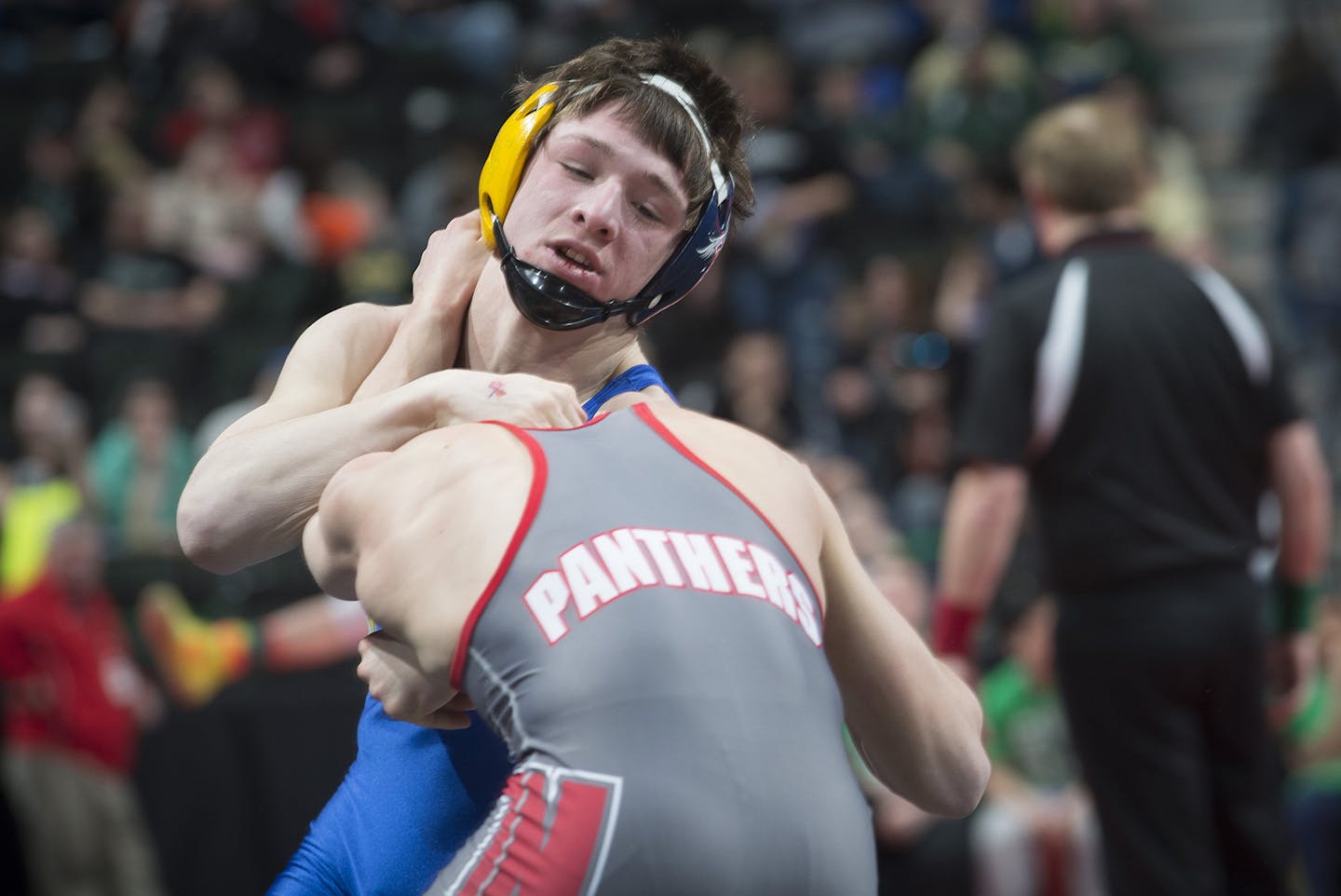 Mitchell McKee tried for an advantage against Wade Sullivan of Lakeville North. (Aaron Lavinsky, Star Tribune)