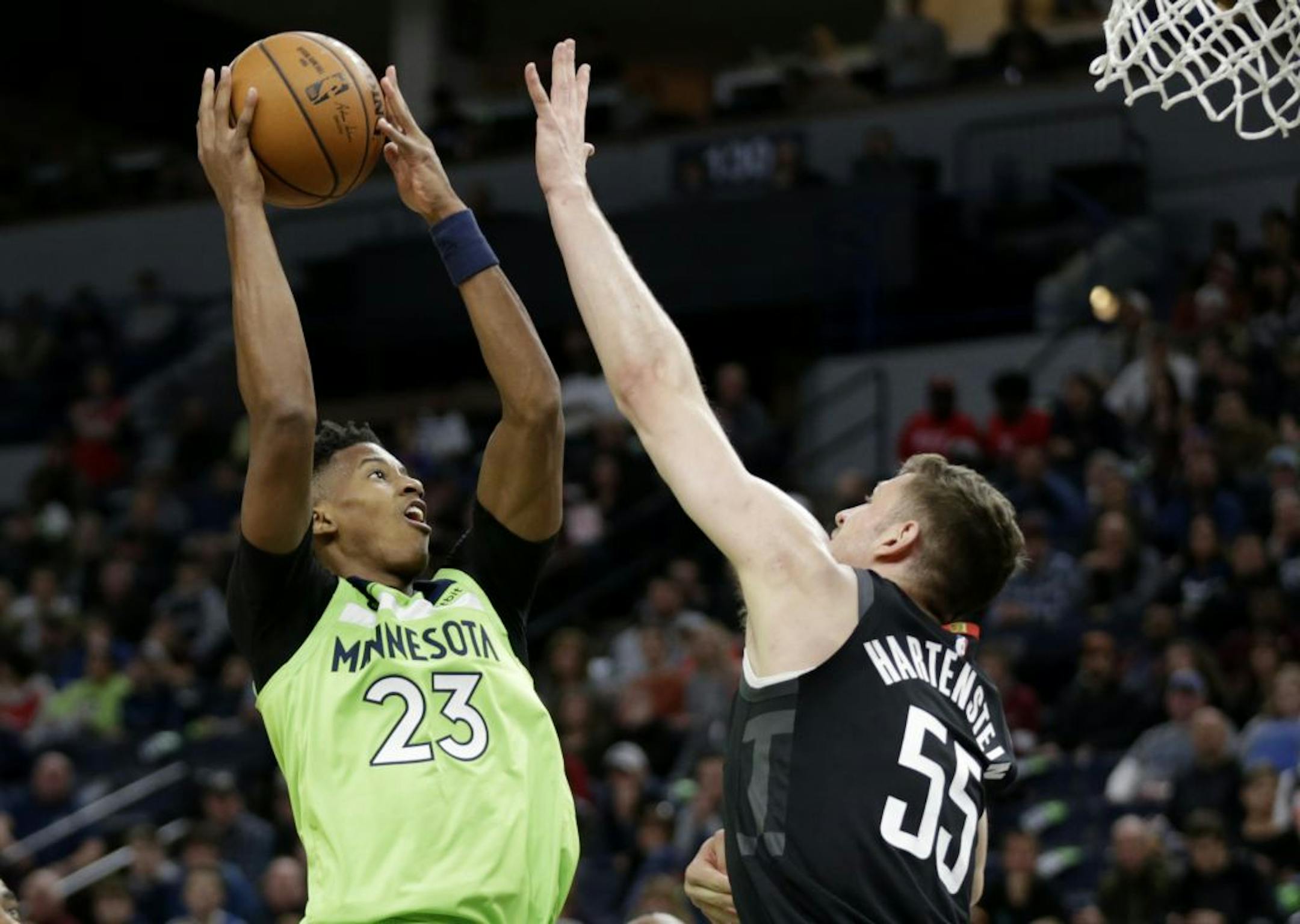 Minnesota Timberwolves guard Jarrett Culver (23) shoots on Houston Rockets center Isaiah Hartenstein (55) in the first quarter during an NBA basketball game Saturday, Nov. 16, 2019 in Minneapolis.