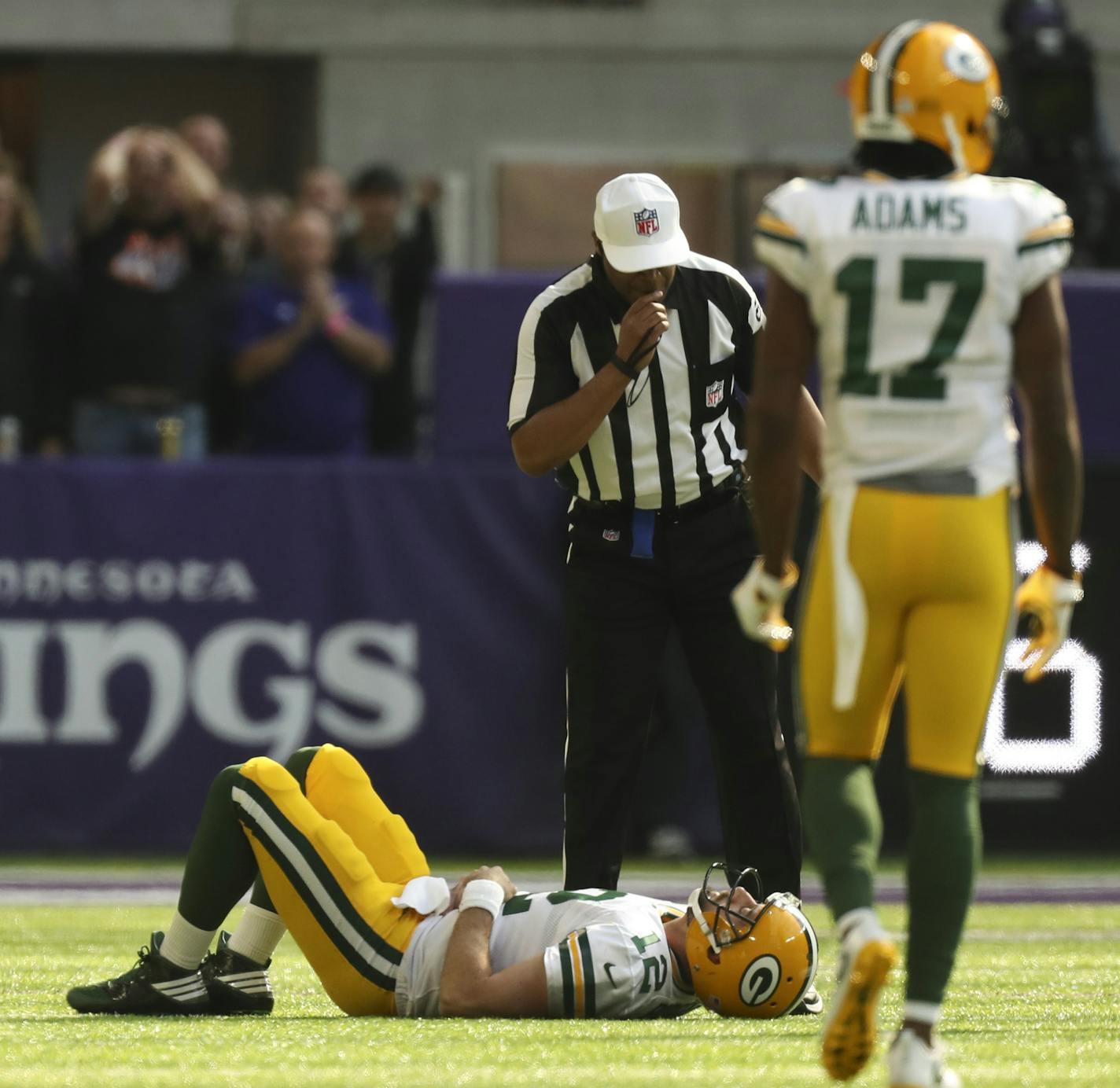 Green Bay Packers quarterback Aaron Rodgers lay on the turf after he took a hard hit from the Vikings' Anthony Barr in the first quarter, breaking his right collarbone. ] JEFF WHEELER &#xef; jeff.wheeler@startribune.com The Minnesota Vikings met the Green Bay Packers in an NFL football game Sunday afternoon, October 15, 2017 at U.S. Bank Stadium in Minneapolis.