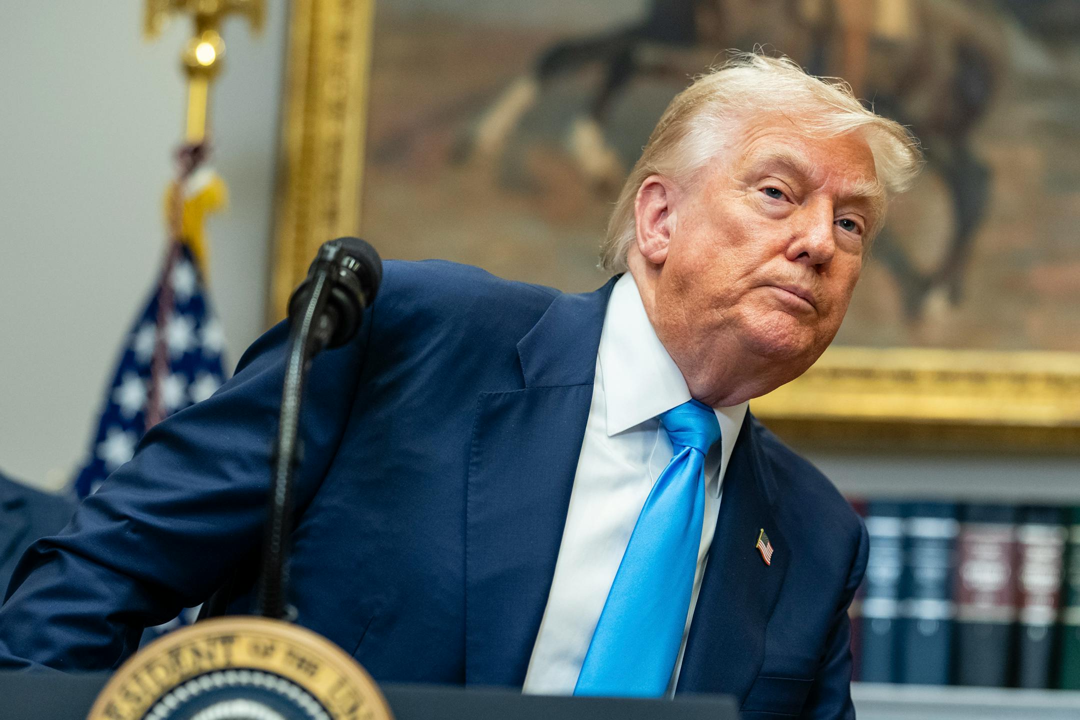 President Donald Trump takes questions from reporters at the White House in Washington, July 30, 2025.