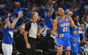 Oklahoma City's Aaron Wiggins (21) celebrates after sinking a basket in the first half of Game 7 in the Western Conference semifinals against Denver o