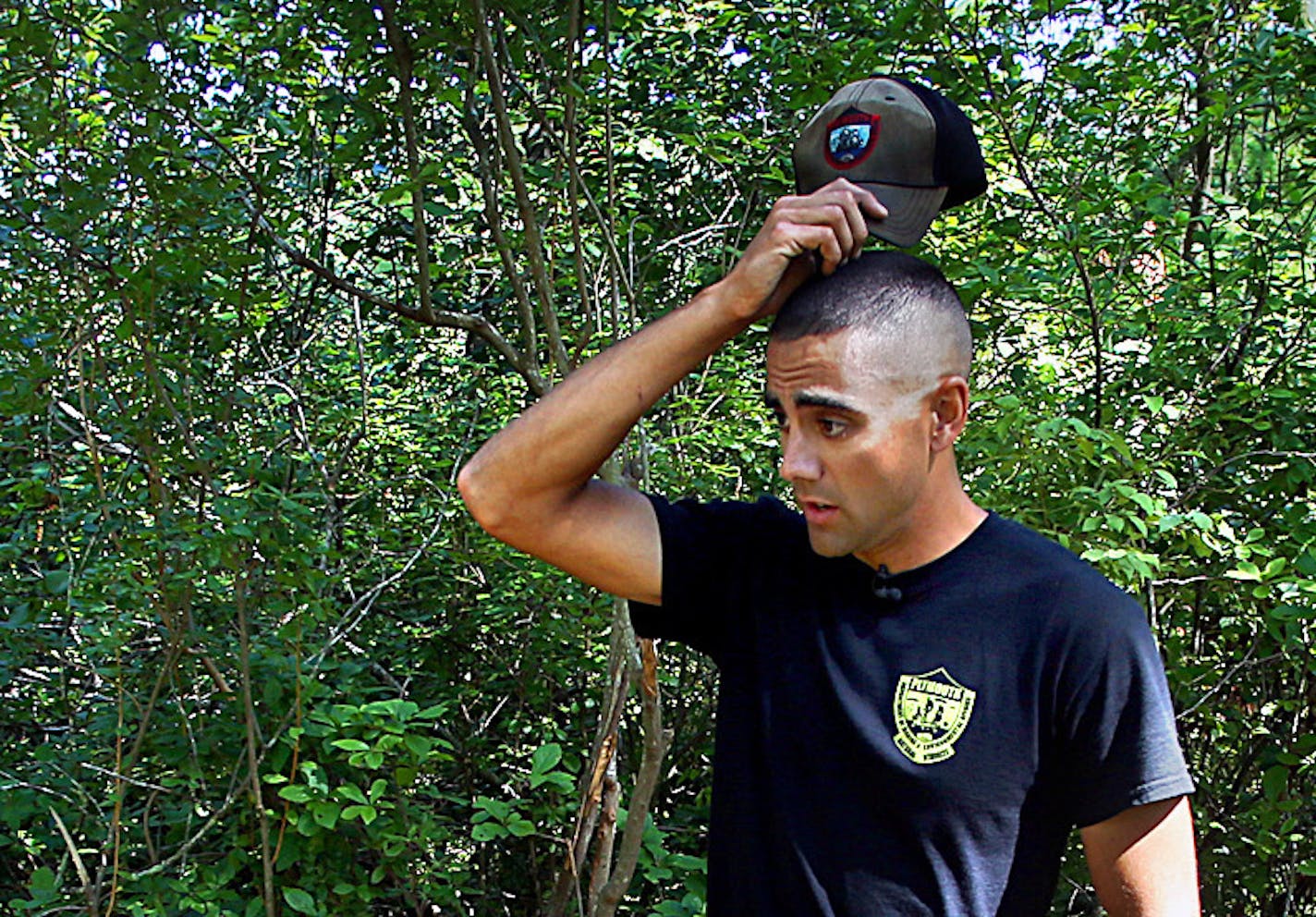 Nate Cristofori, a natural resources warden with the Department of Marine and Environmental Affairs in Plymouth, MA, surveyed damage caused by illegal ATV riding along trails in a nature area near Plymouth. ] JIM GEHRZ &#x201a;&#xc4;&#xa2; jgehrz@startribune.com / Plymouth, MA 9/6, 2014 /1:00 PM / BACKGROUND INFORMATION: Plymouth, MA has some of the most strict laws governing the use of ATVs in the nation. Coverage included ride-a-long with a natural resources warden enforcing tough new laws in