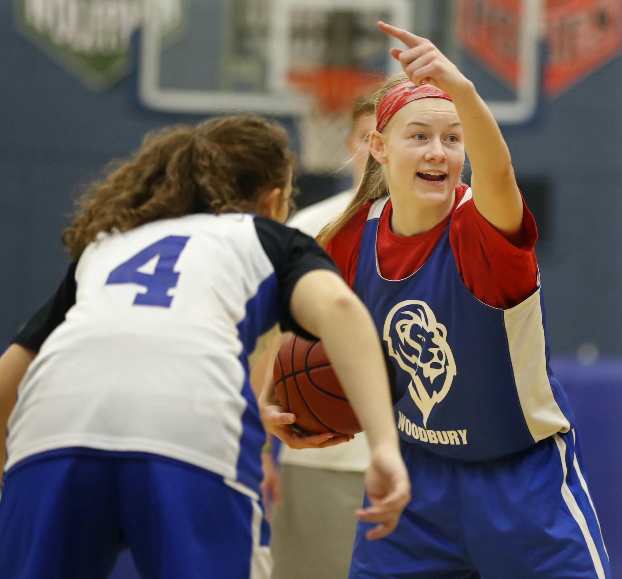 Rachel Hakes is a towering presence on Woodbury's girls basketball team. She was listed at 5-7 as a junior last year and now measures 5-11.] Richard Tsong-Taatarii/rtsong-taatarii@startribune.com