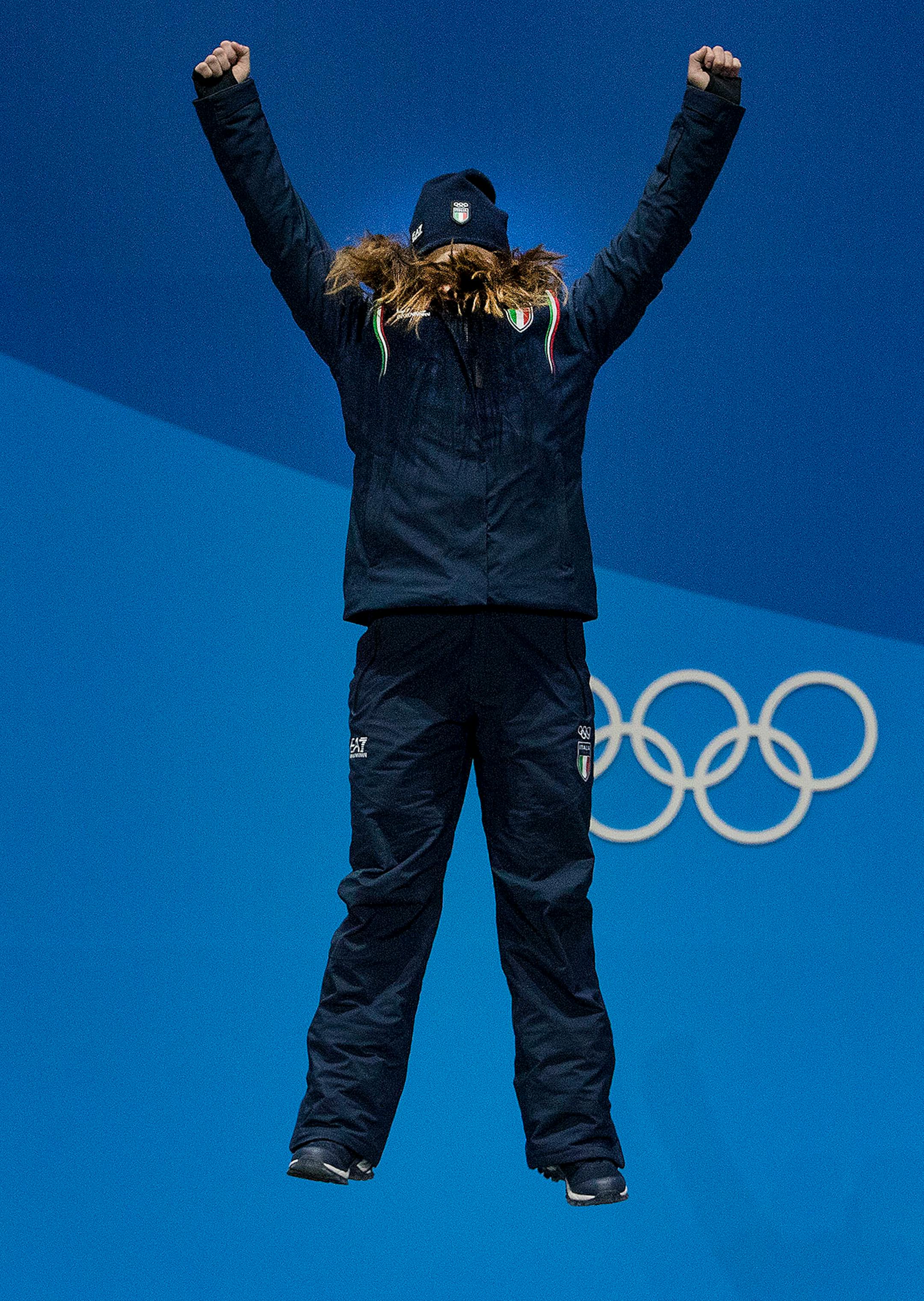 Sofia Goggia's face was covered by her hair as she leapt on to the podium during the Medals presentation at Pyeongchang Olympic Plaza on Wednesday. Sofia Goggia of Italy won the Gold Medal in the Women's Downhill.