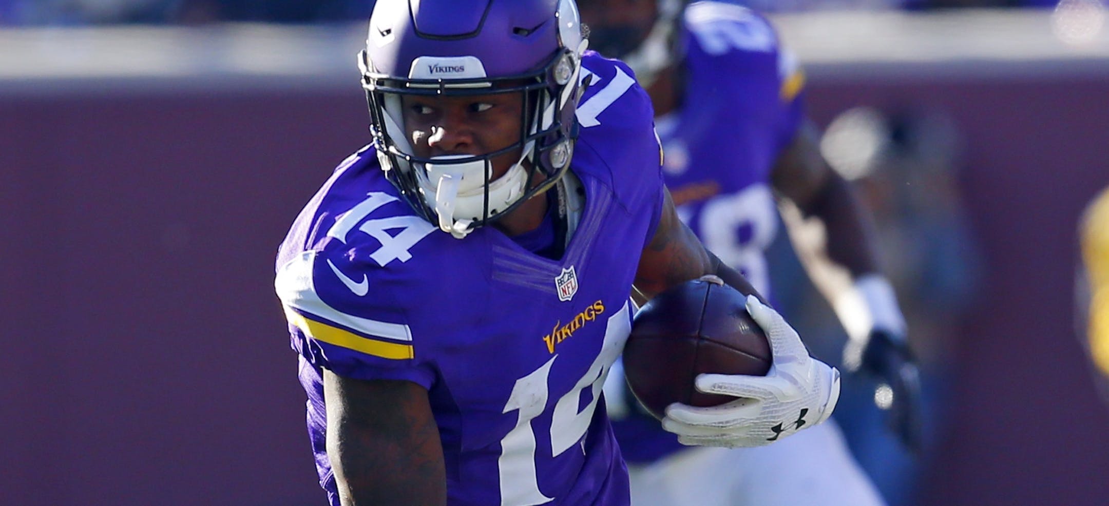 Minnesota Vikings wide receiver Stefon Diggs (14) runs the ball after a catch against the St. Louis Rams during an NFL football game Sunday, Nov. 8, 2015, in Minneapolis. The Vikings won in overtime, 21-18. (Jeff Haynes/AP Images for Panini)
