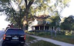Police investigate the Jordan home of a suspect in the shooting of two people who were critically wounded Thursday night in Carver County.