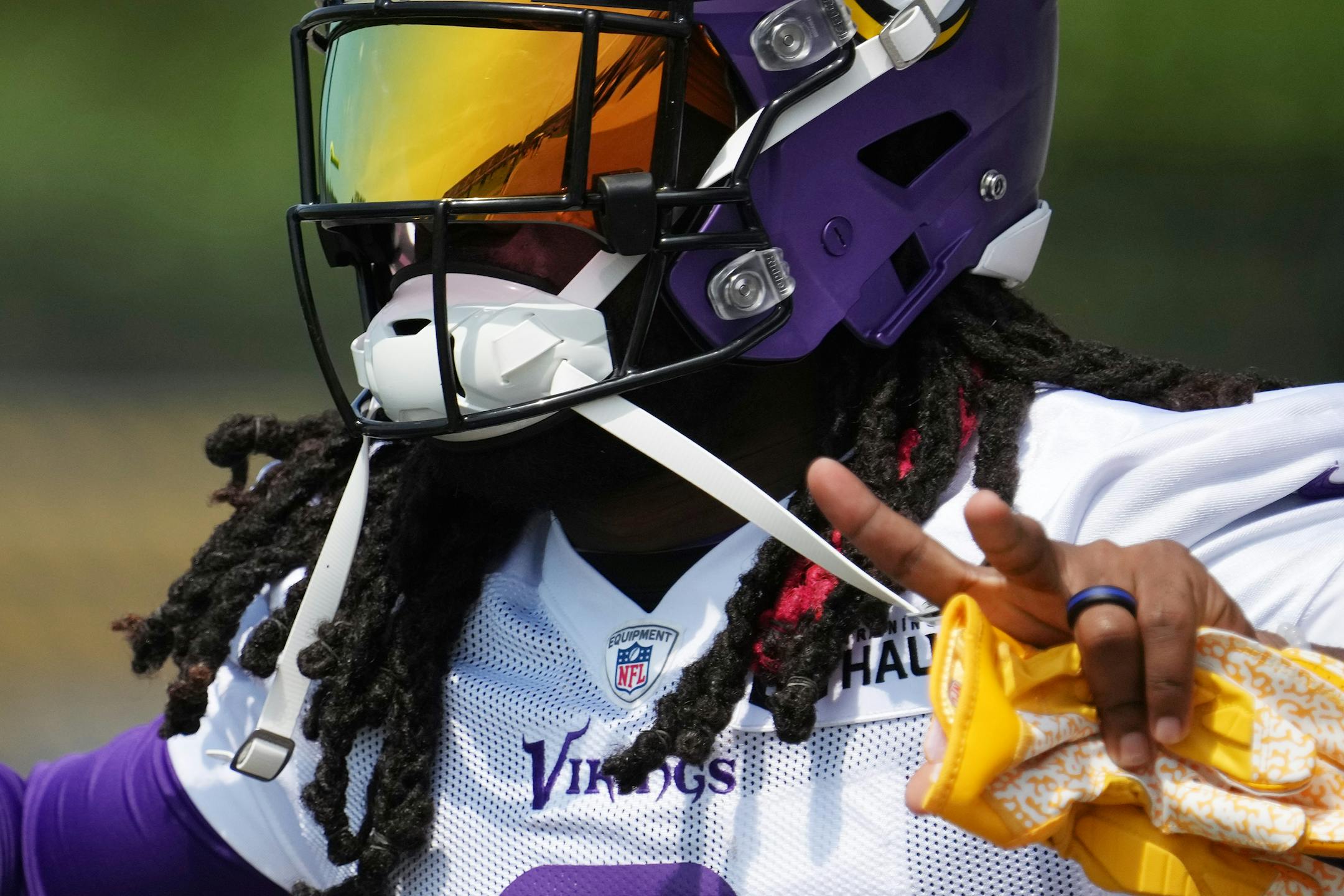 Minnesota Vikings running back Alexander Mattison (2) runs from the locker room onto the field for training camp.